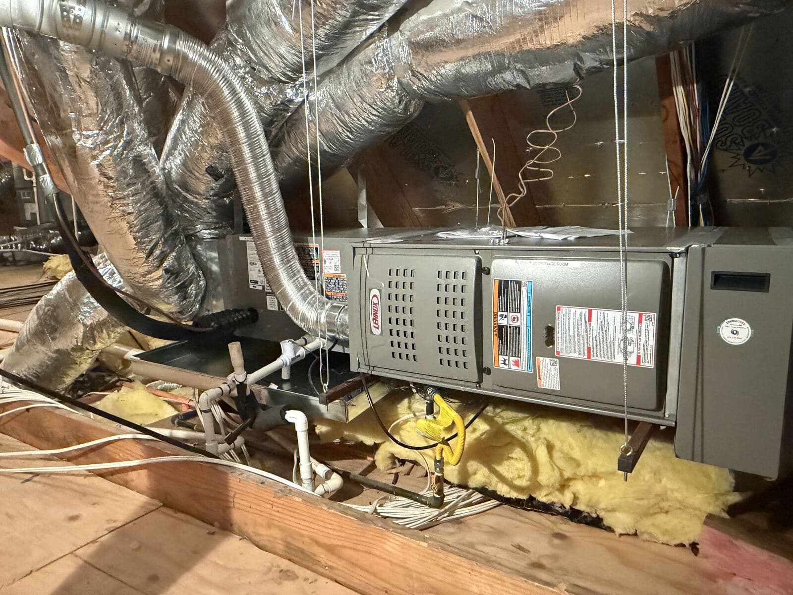 Lennox attic air handler with insulated ductwork and condensate lines