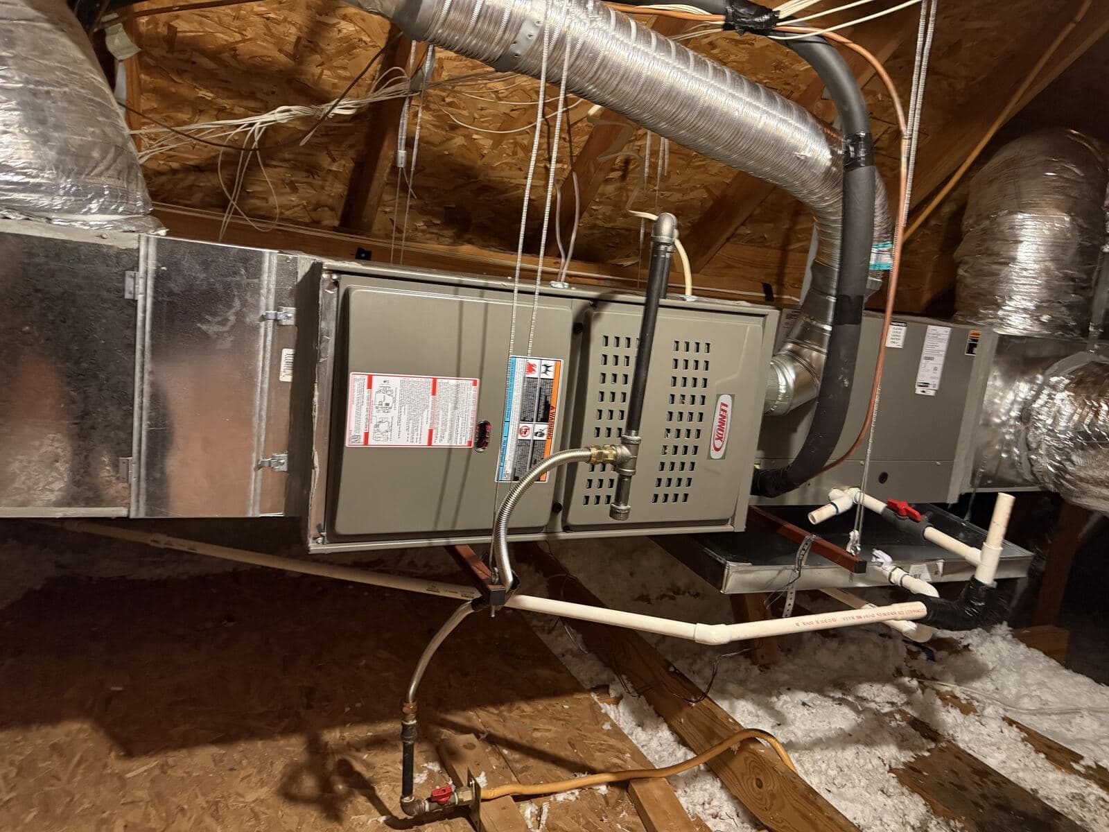 Attic furnace, supply plenum and insulated flex duct runs on a Strike Force installation